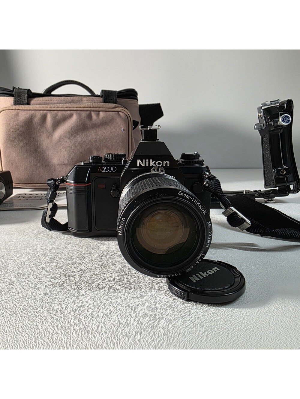 Nikon N2000 35mm Film Camera w/ Nikon Nikkor 35-105mm f3.5-4.5 Zoom Lens Bundle